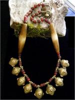 9 Brass Shrunken Heads