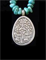 Silver Repousse Back