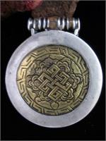 Carved Brass in Silver
